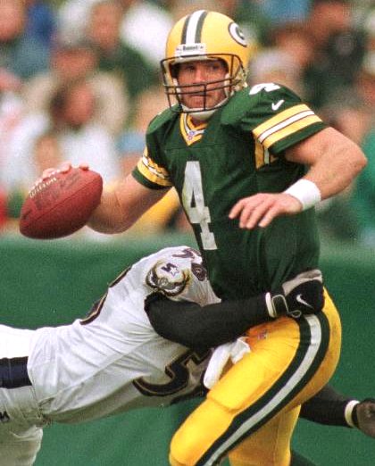 Brett Favre evading a tackler